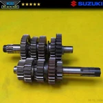 1984 Suzuki RM250 Transmission Gear Box Main Counter Shaft 24131-14310. Fixed Price $71.48.