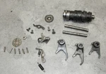 1980 Kawasaki A1 Transmission Shift Drum And Forks 13239-1031. Fixed Price $30.00.