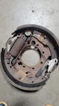 Left Hydraulic Brake Backing Plate 12-1/4 Fits Dexter K23-404-00 10KHD 9-27. Fixed Price $195.00.