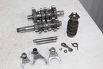 1999 - 2002 Kawasaki Oem Transmission Set Shafts Gears Forks Drum 6. Fixed Price $112.00.