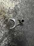 2006 Kawasaki Output Shift Fork Left Assembly # 13140-0033 KX250F Stroke. Fixed Price $24.95.
