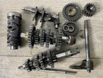2003 Suzuki Transmission Gears Shaft Drum Fork Assembly Oem. Fixed Price $27.99.