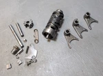 Suzuki DS100 Transmission Shift Drum Cam Stopper Forks. Fixed Price $24.00.