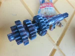 Suzuki Nos TM100 TM125 1974, Counter Shaft With Gears New 24120-28302. Fixed Price $102.34.